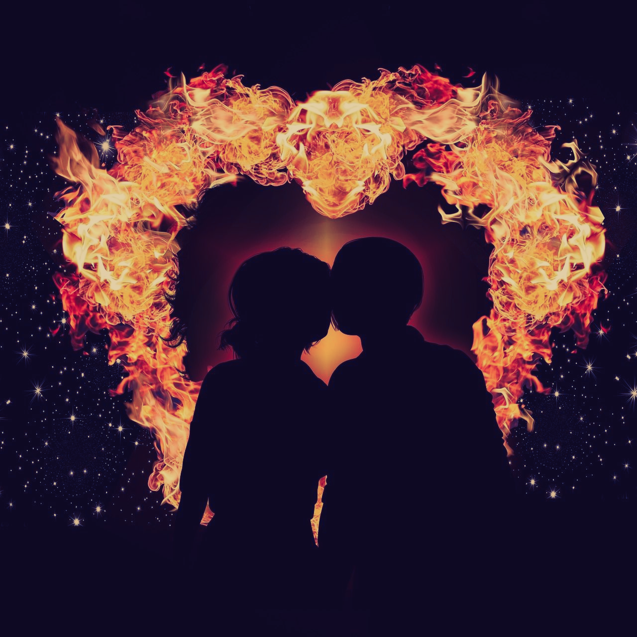 A couple kissing in front of a heart shaped fire.